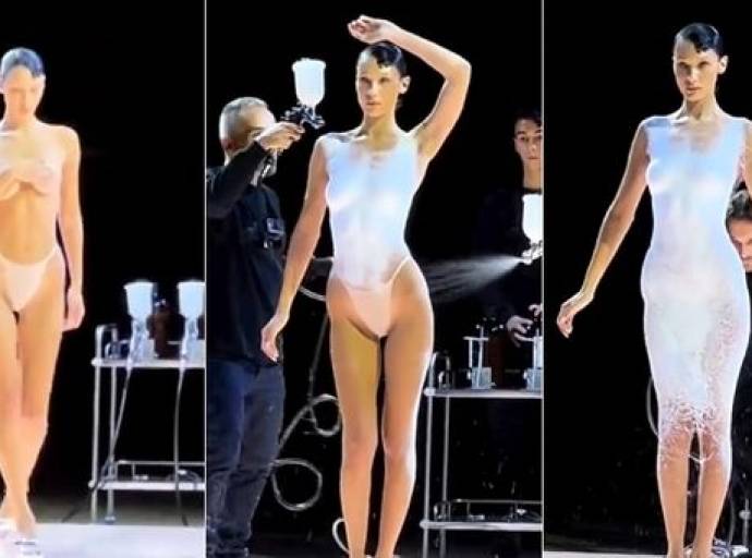 Bella Hadid ha sfilato con il primo abito spray di Coperni, realizzato in diretta in chiusura del fashion show del marchio parigino